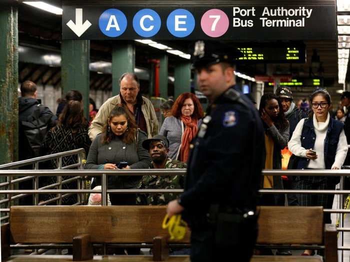 A commuter was killed after being pushed onto the tracks in front of a subway in New York