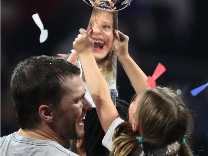 Photographer captures an amazing photo of Tom Brady, his daughter, and the Lombardi Trophy