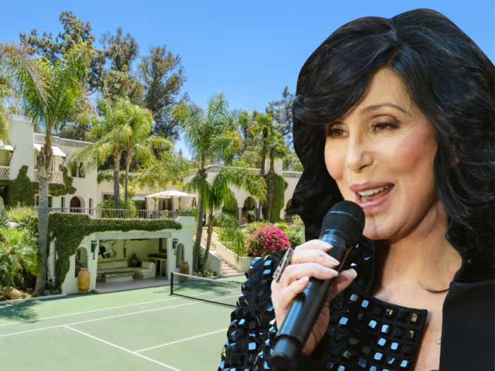 A Beverly Hills mansion once owned by Cher is back on the market with a 44% discount - here's a look inside the 11-bedroom, 17-bathroom estate