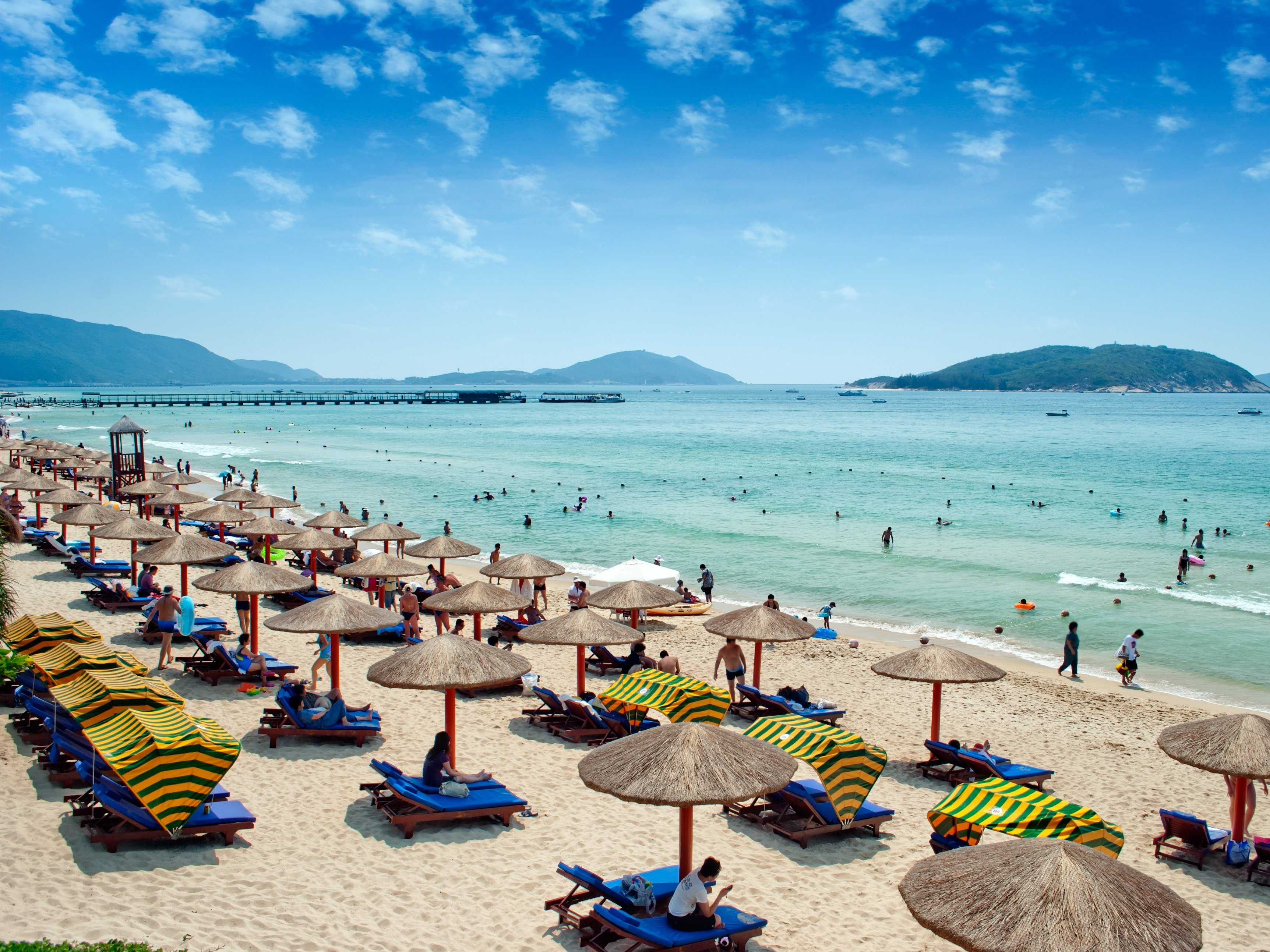 http://www.businessinsider.in/photo/46180592/38-places-you-need-to-visit-in-china/Sunbathe-on-the-beaches-of-Hainan-.jpg