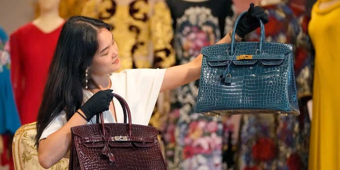 Luxury retail workers earn about $45,000 per year to sell handbags and jewelry that can cost more than their take-home pay