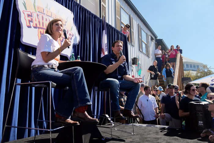 Gov. Kim Reynolds urged anti-DeSantis protesters to be 'Iowa nice' as they rallied against his presidential campaign at the state's iconic fair