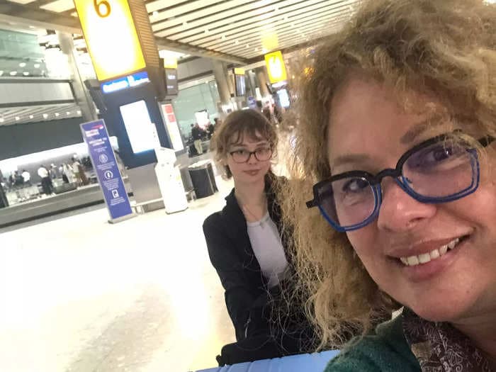 I fly business class and leave my kid in economy. I get called a 'bad mom' but the perks are worth it &mdash; and I share them.