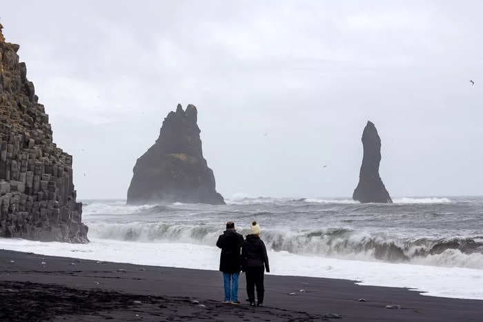 Tourists in Iceland standing too close to the ocean almost got swept away by dangerous 'sneaker waves'