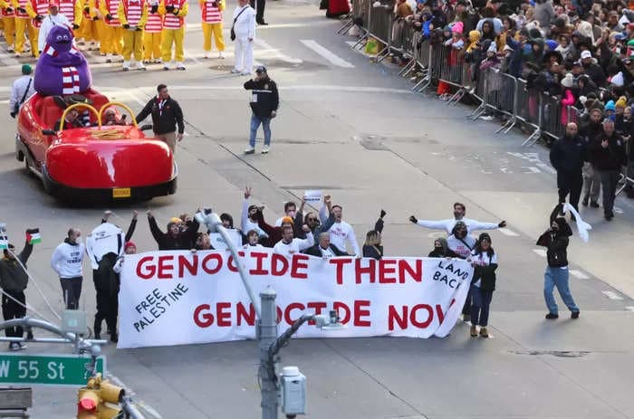 Pro-Palestine protestors briefly blocked Macy's Thanksgiving parade route by gluing their hands to the ground