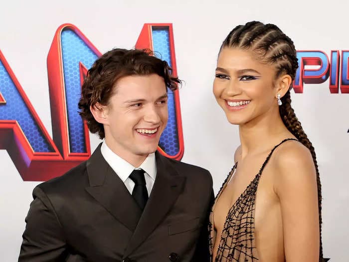 Tom Holland says he rewatches 'Spider-Man' with Zendaya so they can feel like they're 19 again