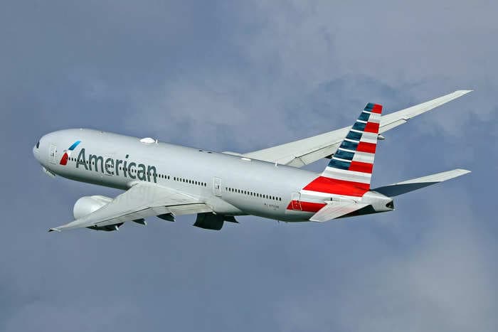 First-class American Airlines passenger complains of racial discrimination, saying she was made to use economy bathroom