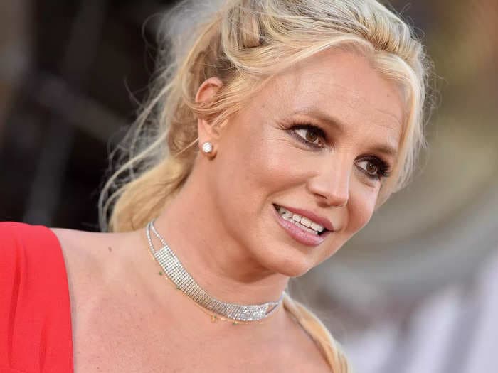 Britney Spears shared a photo of her bruised ankle and said she felt 'harassed' after paramedics responded to a 911 call to her hotel