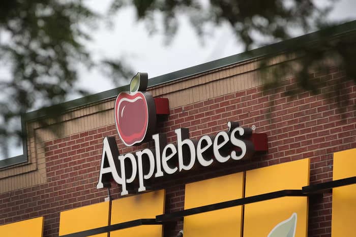 'Why would you eat a $10 burger out of a paper bag in your car?' Applebee's throws shade at fast food chains as it touts deals