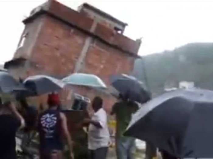 Multistory House Collapses Down A Hill In Rio De Janeiro [VIDEO]