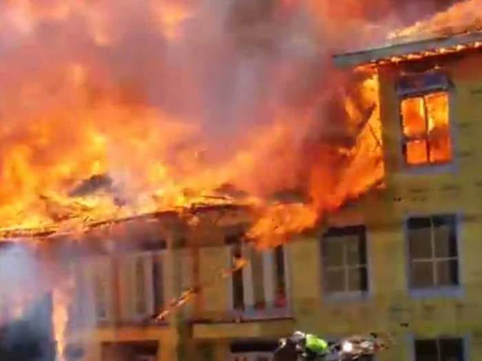 Construction Worker Rescued From Burning Houston Building Moments Before The Roof Collapses