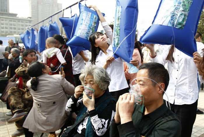 Residents Of A Polluted Chinese City Clamored For Fresh Mountain Air That Was Delivered In Bags