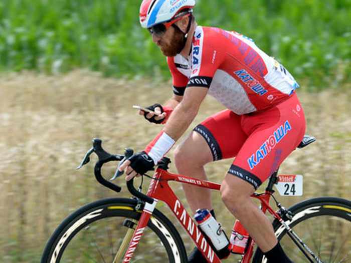A Cyclist In The Tour De France Got Totally Busted For Using His Cellphone - At Nearly 40 MPH