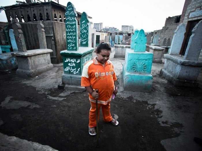 Meet The Egyptian Families Who Live Among The Tombs In Cairo's Massive Cemetery