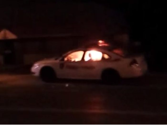 This Video Appears To Show The Moment A Police Car Was Lit On Fire In Ferguson