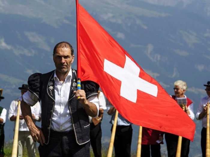 IT'S OFFICIAL: You have to pay the Swiss government to take your money for the next 10 years