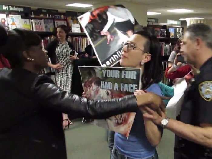 Animal rights activists crashed Kim Kardashian's book signing and chanted 'murderer'