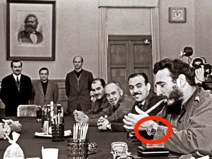 PHOTO: Fidel Castro, wearing two Rolexes, lighting a cigar while visiting the USSR for the first time