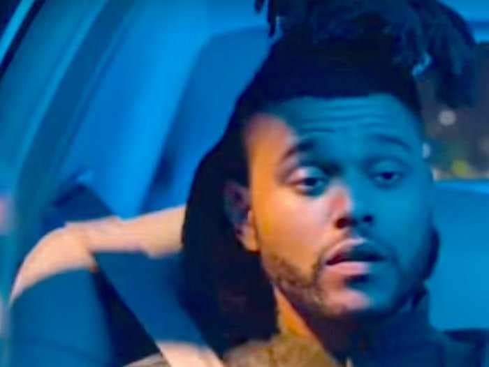 Apple launched two new ads for Apple Music last night featuring The Weeknd and ... John Travolta