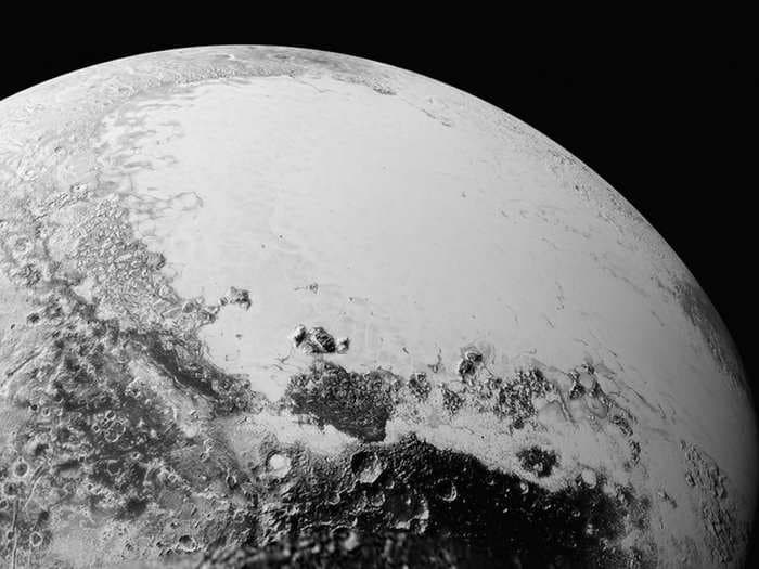 The new Pluto photos reveal complex features that 'rival anything we've seen in the solar system'