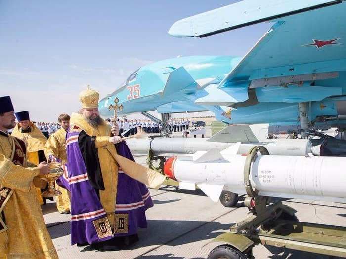 PHOTO: An Orthodox priest blesses Russian missiles for airstrikes in Syria