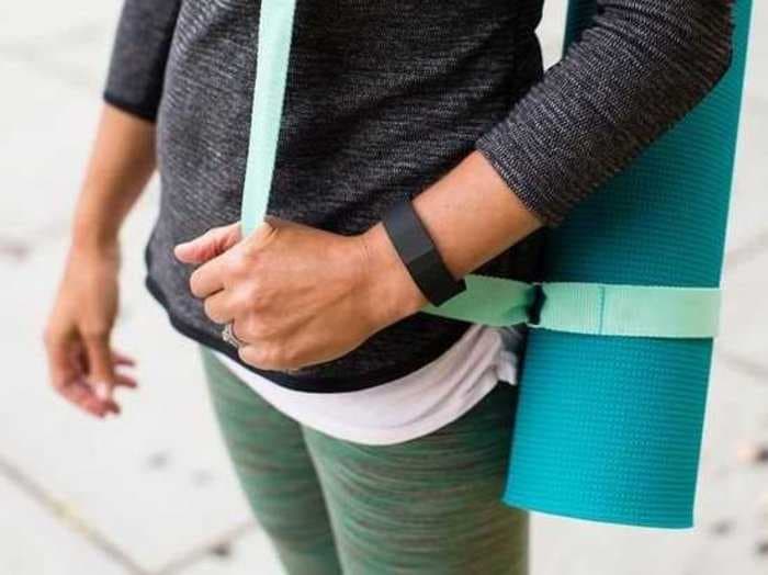 Fitbit smashes expectations for earnings and revenues, stock slides