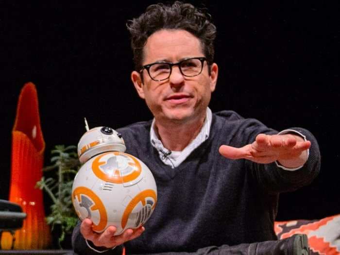 A perfect moment of J.J. Abrams watching the 'Star Wars' trailer for the first time with a group of fans