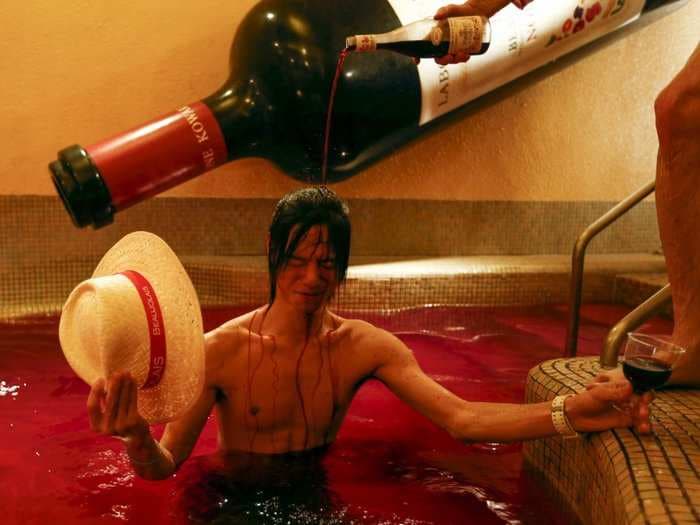 People in Japan are obsessed with a French holiday where you celebrate by bathing in a pool of wine