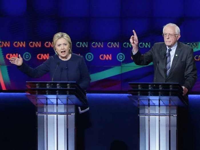 'Excuse me, I'm talking': Watch Clinton and Sanders spar over Wall Street at the Democratic debate