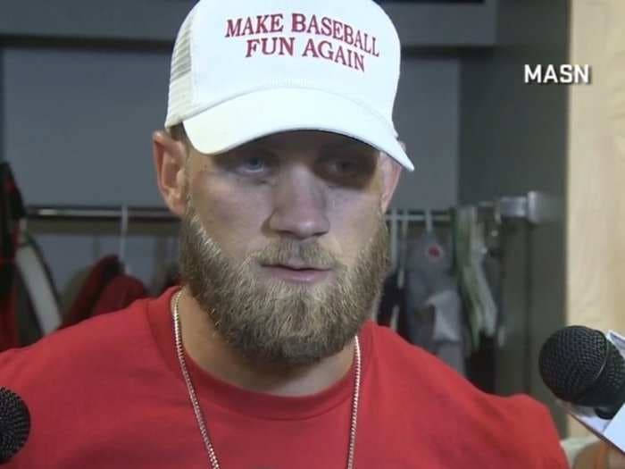 Bryce Harper wore a 'Make Baseball Fun Again' hat in the locker room after the Nationals' Opening Day win