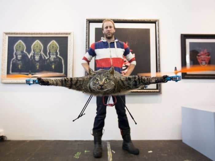 The artist who turned his dead cat into a drone is building a helicopter out of a cow