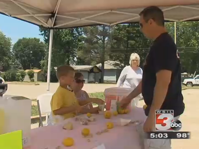 An 8-year-old boy raised hundreds of dollars selling lemonade to help pay for a stranger's funeral