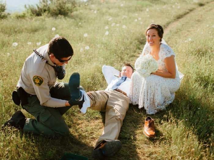 A groom was bitten by a rattlesnake - and the wedding photographer captured it all on camera