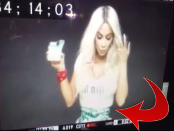 Kim Kardashian claims this behind-the-scenes photo proves her waist wasn't Photoshopped in new Fergie music video