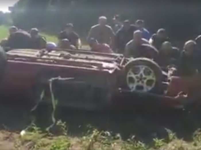Good samaritans overturned a flipped car to save the driver trapped inside