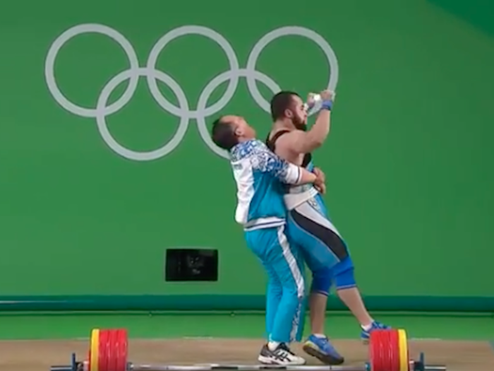 Kazakhstan weightlifter has celebration of the Olympics after winning gold - but his victory didn't come without controversy