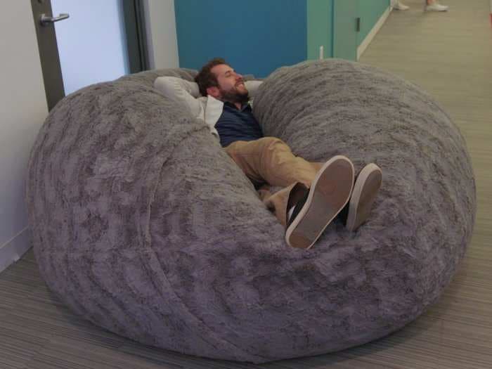 The internet is losing its mind over this gigantic fluffy pillow that's as big as a bed