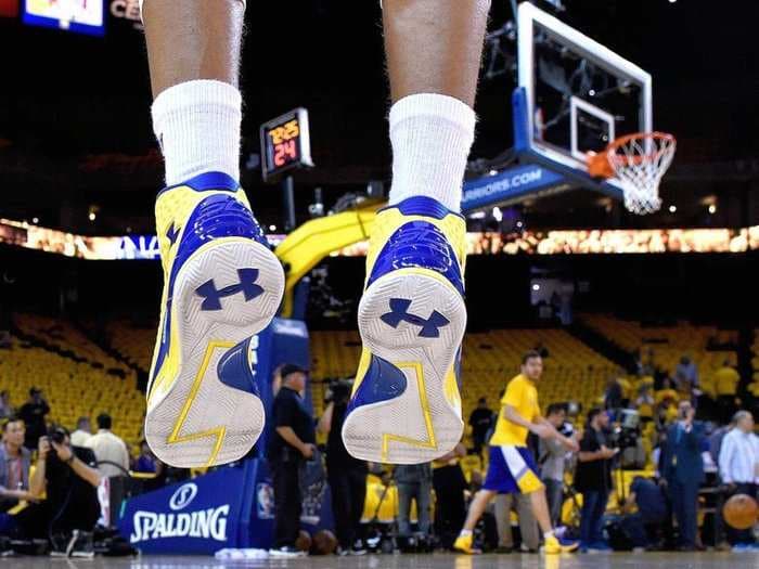 Under Armour loses less money than expected, stock spikes