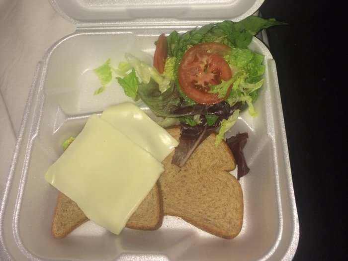 People paid $12,000 to go to a music festival with beachside BBQs and champagne brunches - and all they got were these sad cheese sandwiches