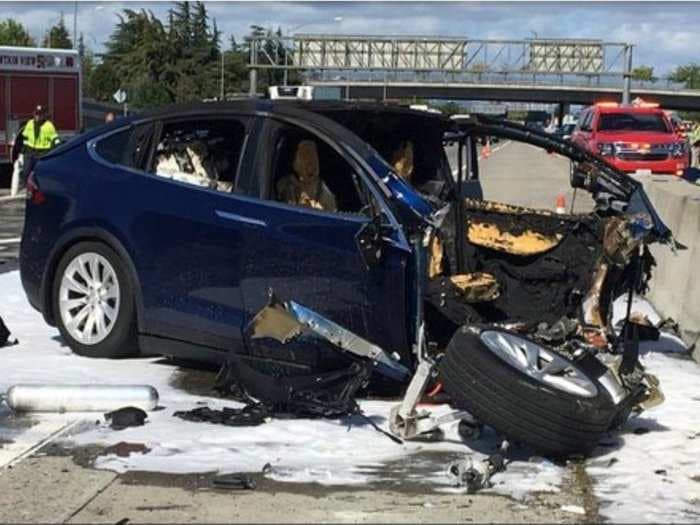 A Tesla Model X caught on fire after crashing into a highway barrier - and Tesla has a theory about why the crash was so bad