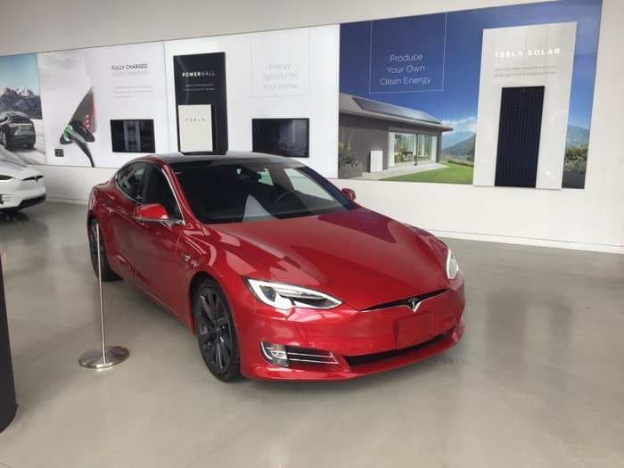 We visited a Tesla showroom and a Mercedes-Benz dealership - here are the biggest differences between the two