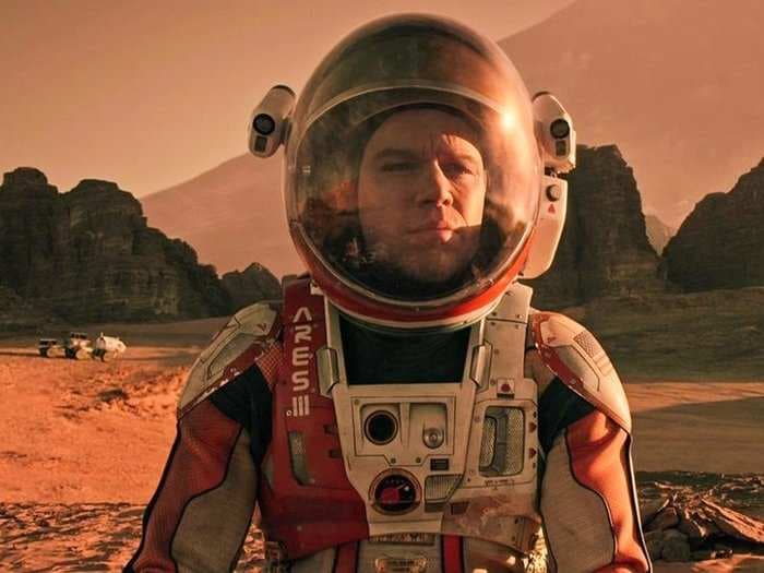 A former NASA scientist says 'The Martian' movie 'is completely doable.' But Elon Musk's city on Mars is another story.