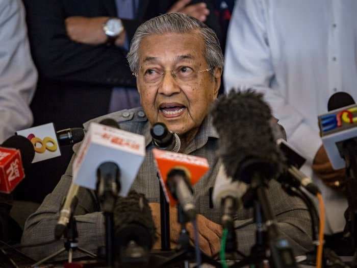 Malaysia's new prime minister will no longer step aside for jailed colleague and expects to soon lay charges against his allegedly corrupt predecessor