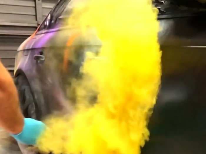 This shop paints cars using 'color bombs'