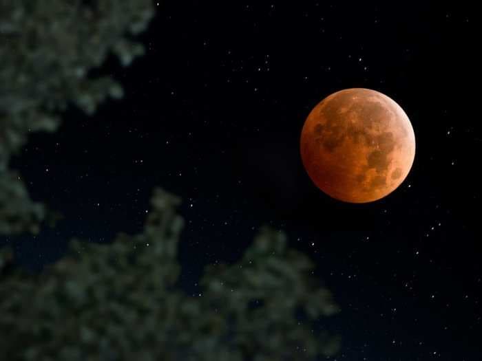 The longest total lunar eclipse in a century is about to happen - here's how Earth will color the moon blood-red