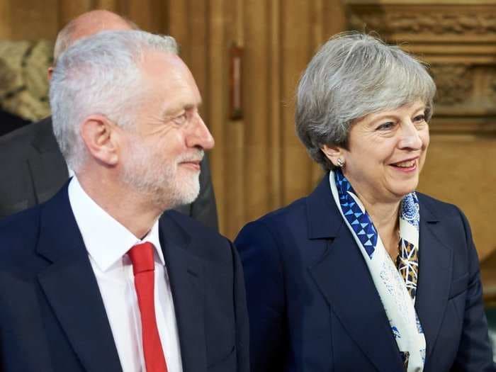 2 prominent Conservative MPs want Theresa May to work with Jeremy Corbyn to deliver Brexit