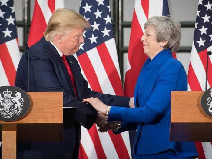 Theresa May accuses populist politicians like Trump of trading on the 'politics of division'