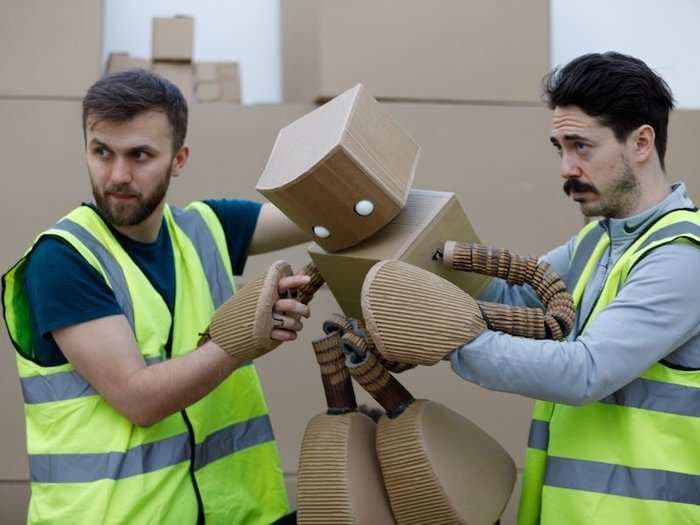 Amazon's intense warehouse working conditions are being turned into a play featuring a robot made from delivery boxes