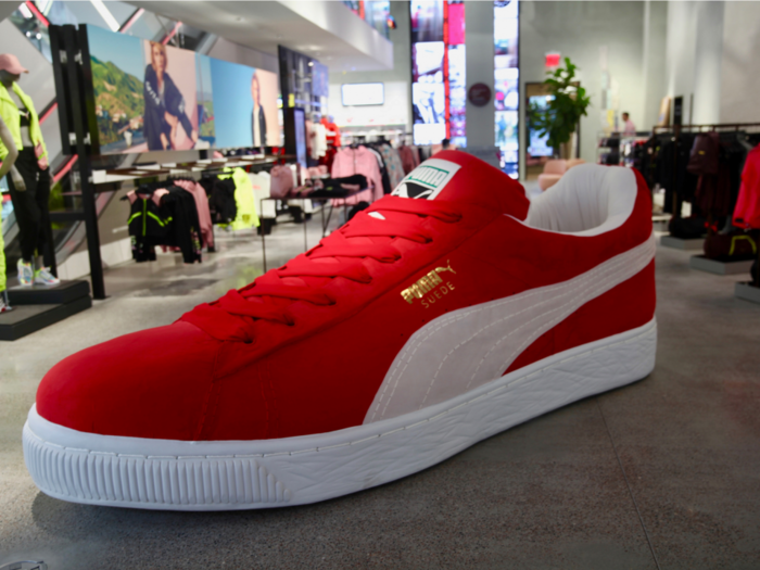 Puma's massive new flagship store has giant shoes, video games, and a virtual soccer field. We visited and saw why sales are soaring.