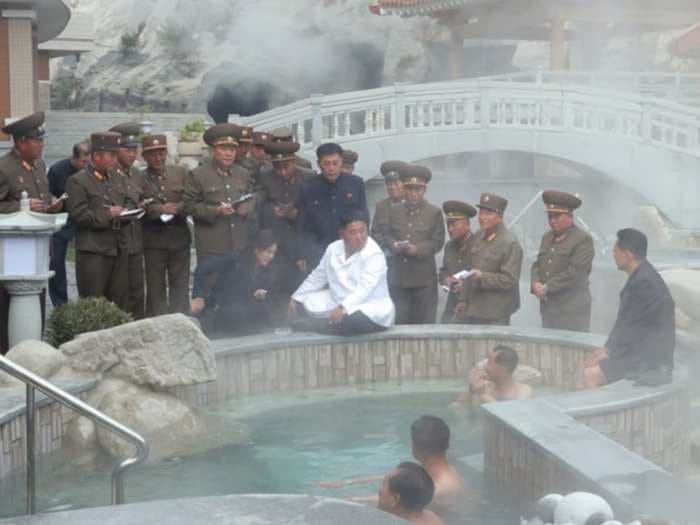 Kim Jong Un visited a brand new spa resort in North Korea and posed for photographs on the edge of a hot tub